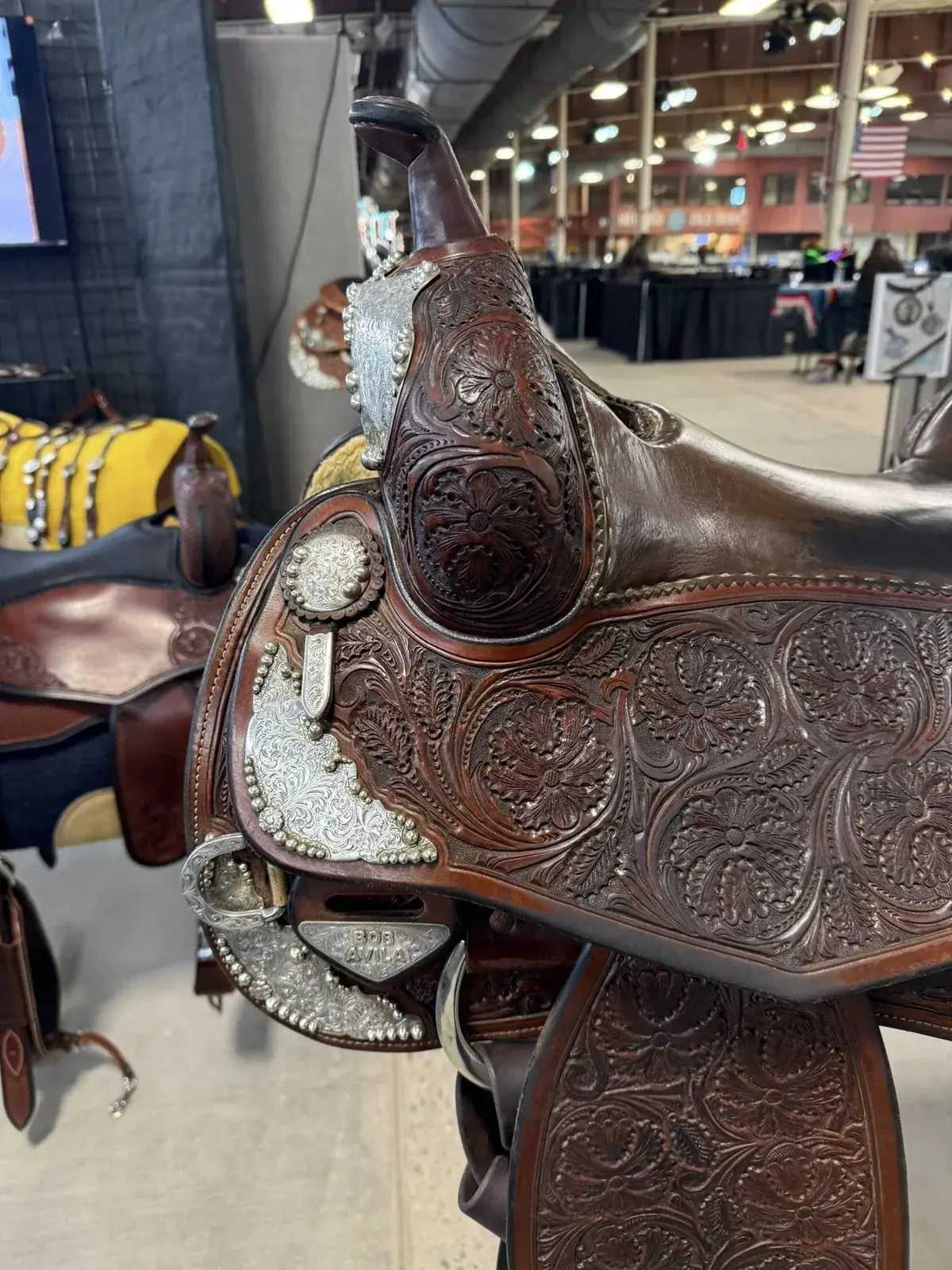 Bob Avila — horn swell left with engraved silver cap and Bob Avila badge