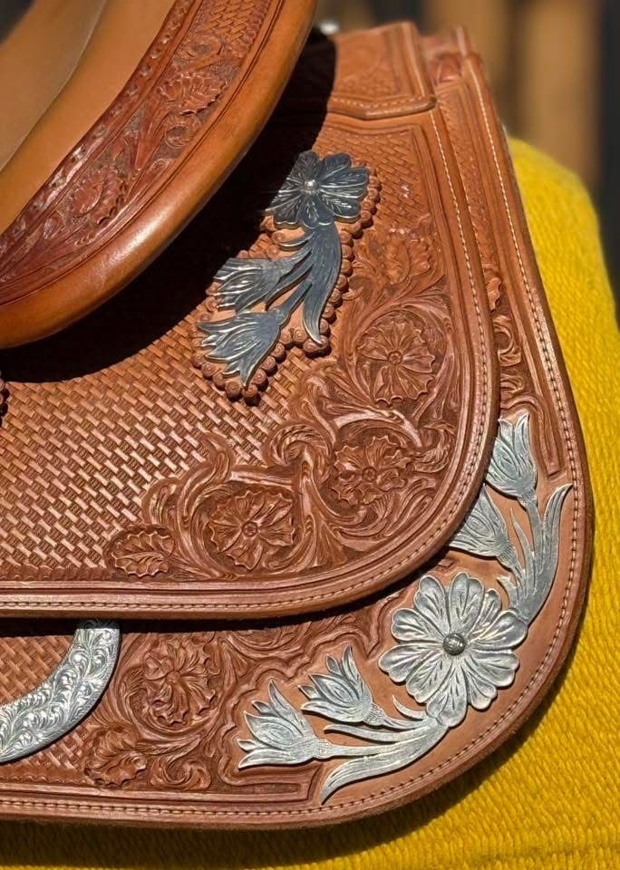 Bob's Custom 16 — skirt oxidized silver floral corner plate close-up