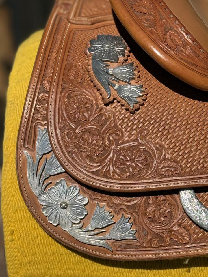 Bob's Custom 16 Tan — skirt silver floral appliqué close-up
