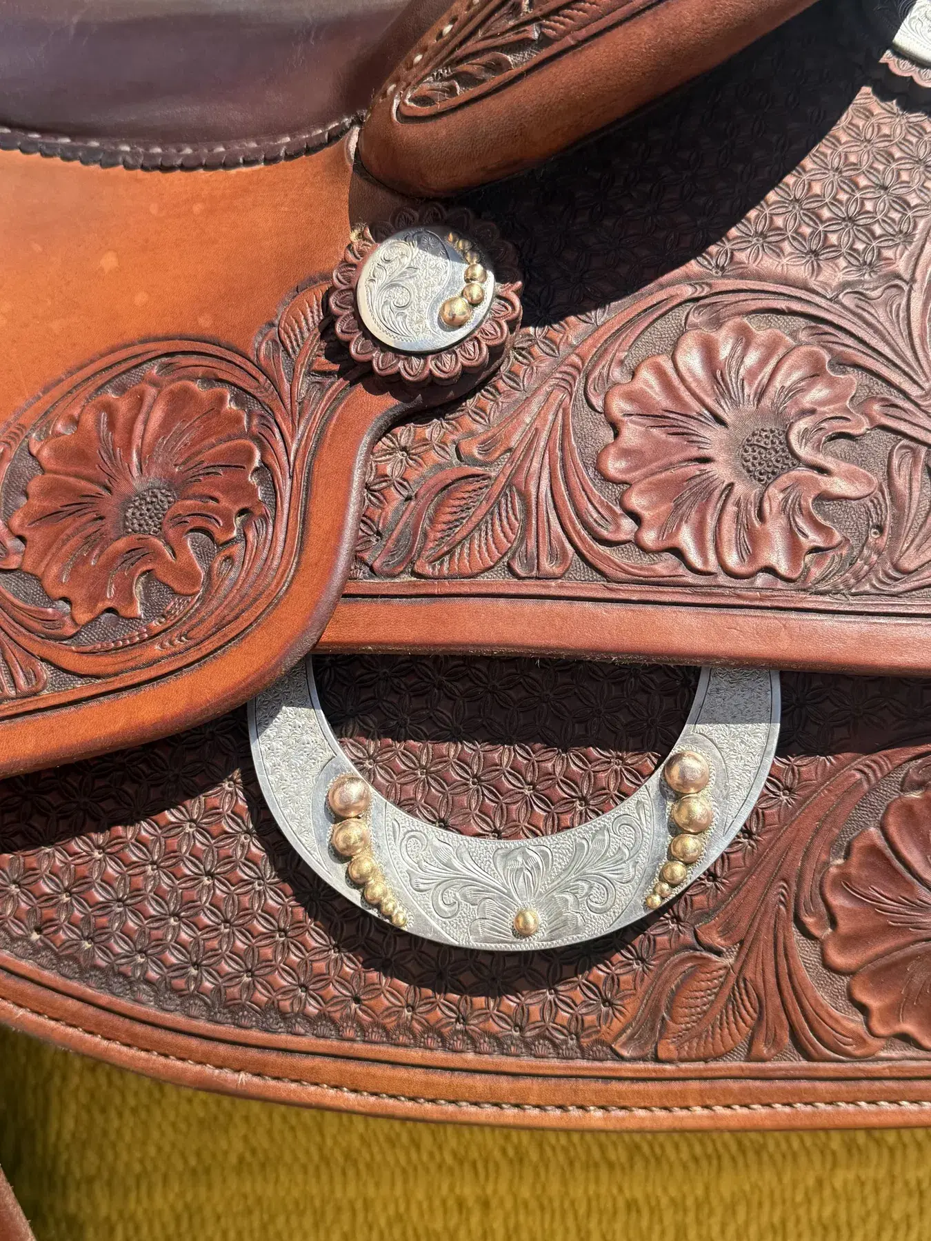 Craig Schmersal Reiner — sterling silver dee ring and concho close-up