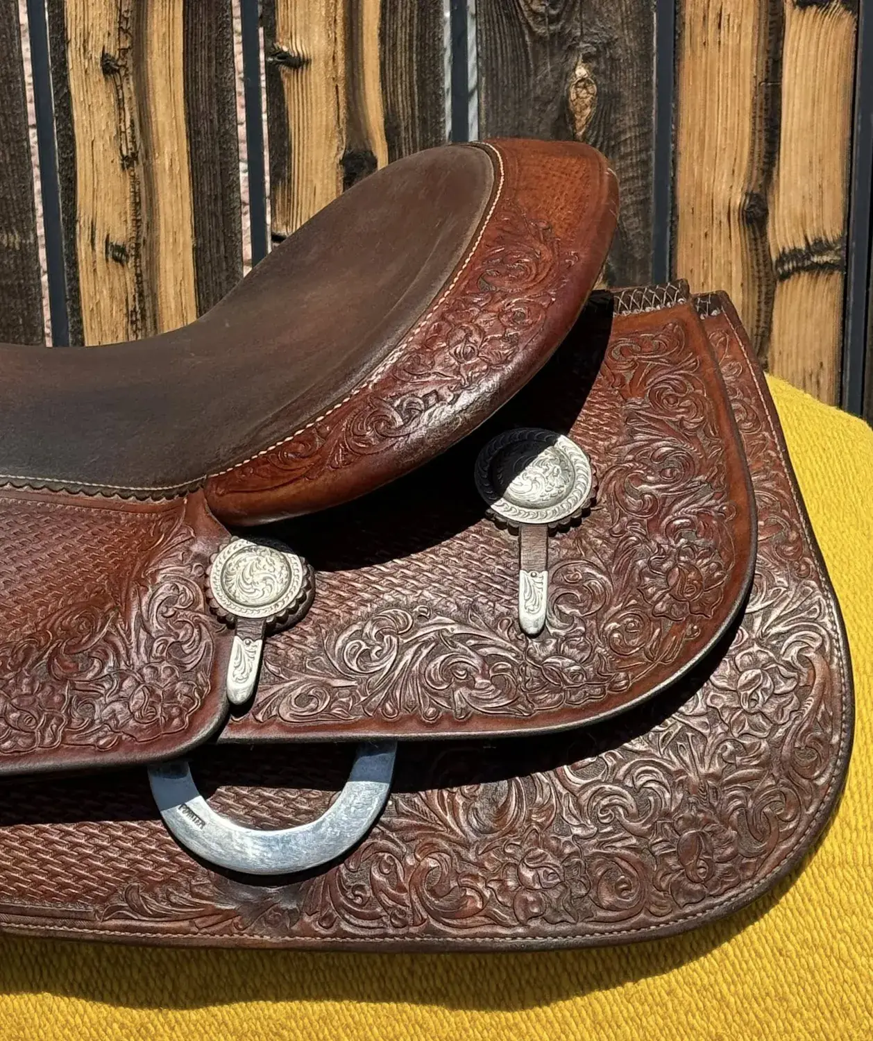 Donn Leson TVB 386 — skirt silver concho and tooling detail
